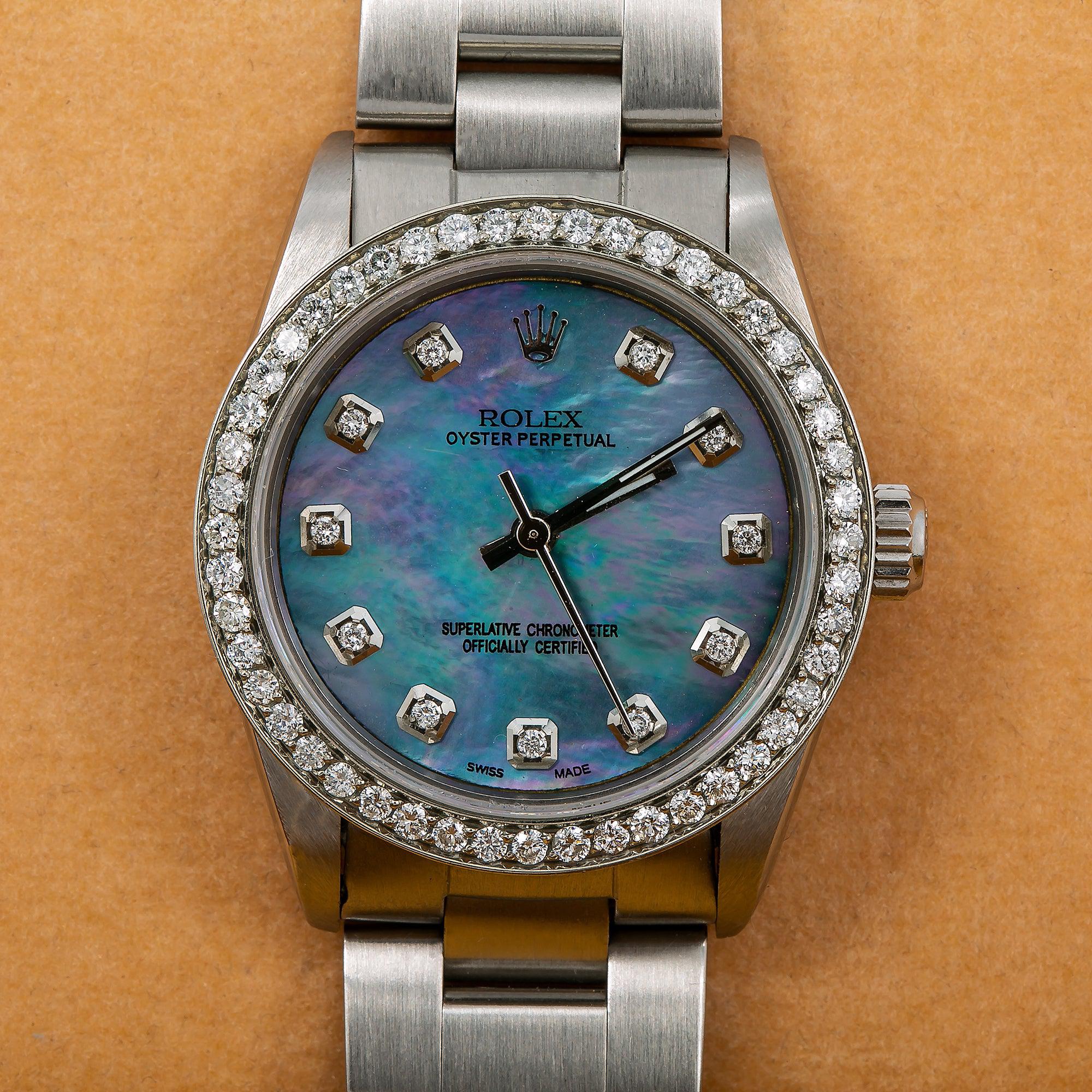 Rolex Oyster Perpetual 67513 31MM Blue Mother of Pearl Diamond Dial With 1.05 CT Diamonds