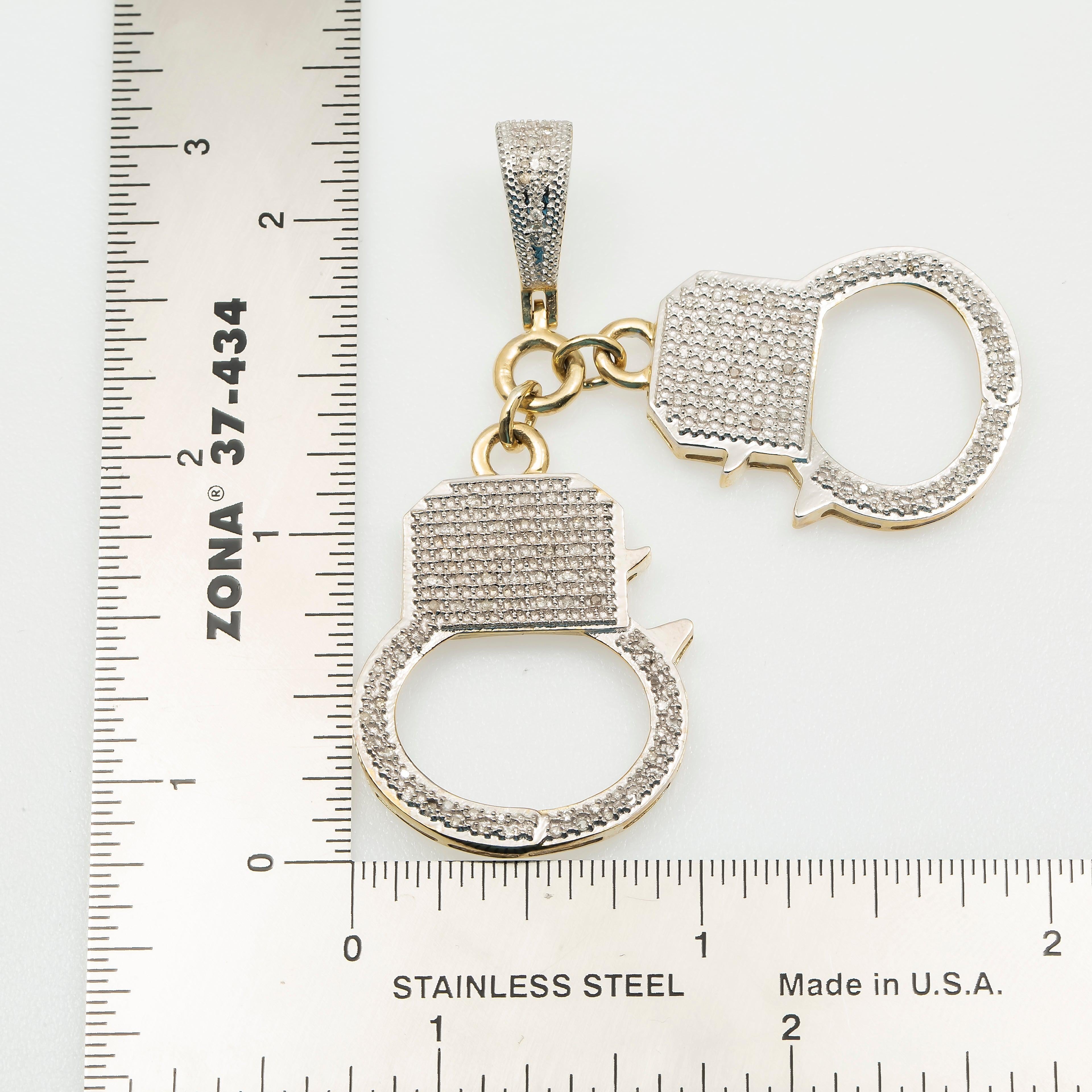 10K GOLD DIAMOND HANDCUFFS PENDANT 0.47 CT