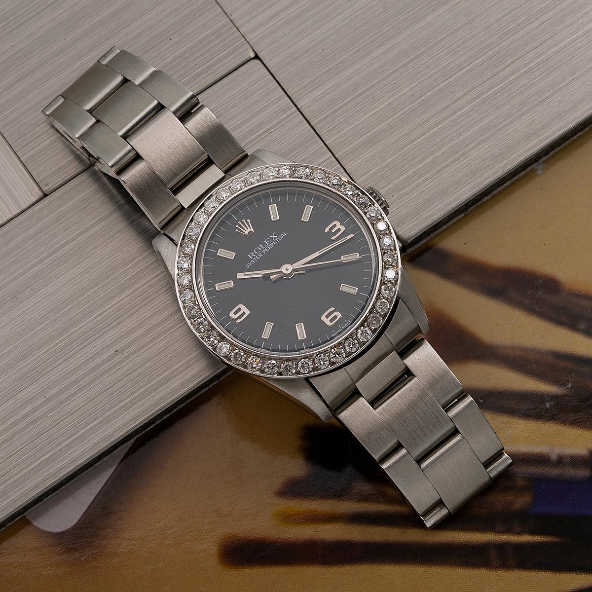 Rolex Oyster Perpetual Diamond Watch, 77080 31mm, Black Dial With 0.90 CT Diamonds