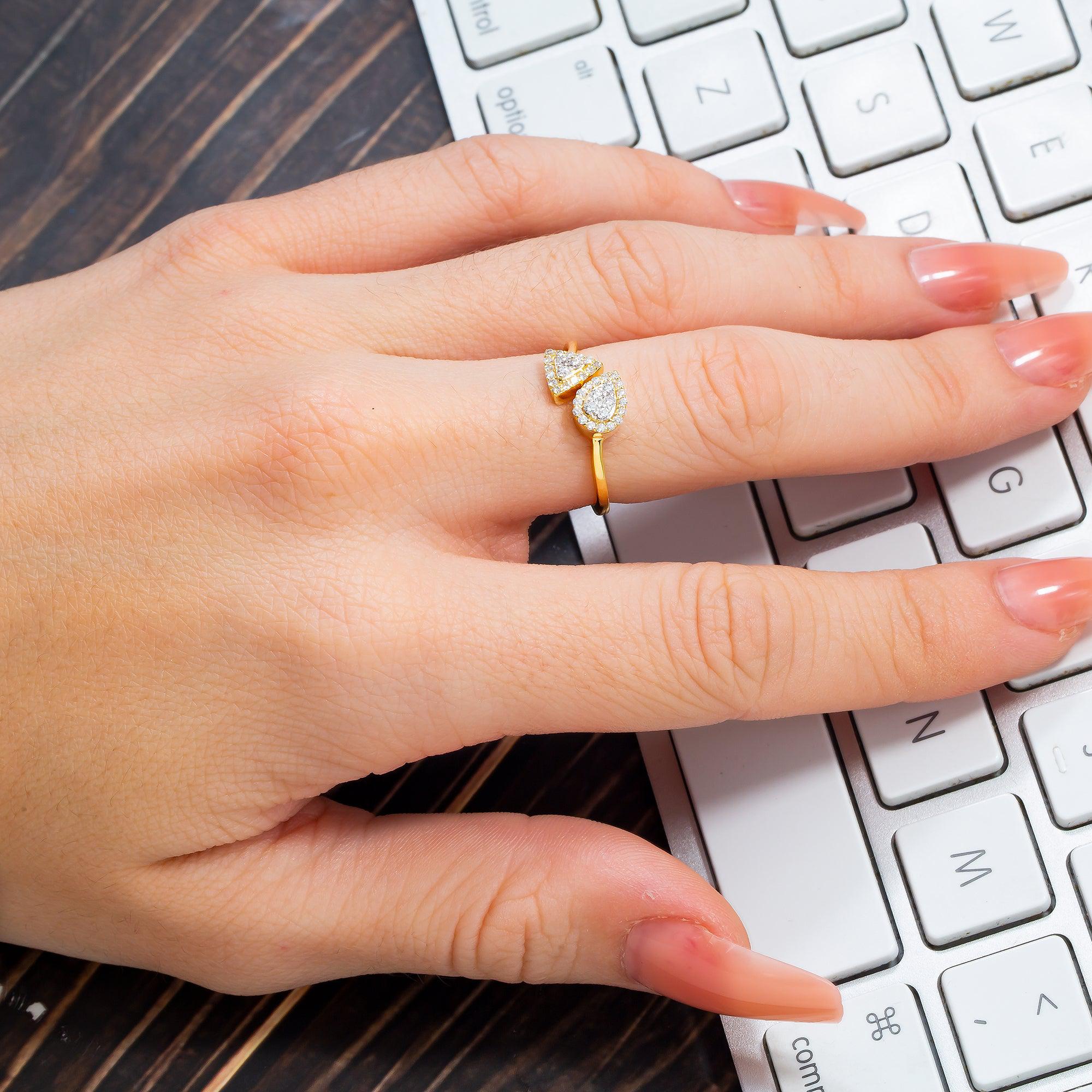 14K GOLD PEAR AND TRIANGLE TWO DIAMOND CLUSTER RING 0.25 CT