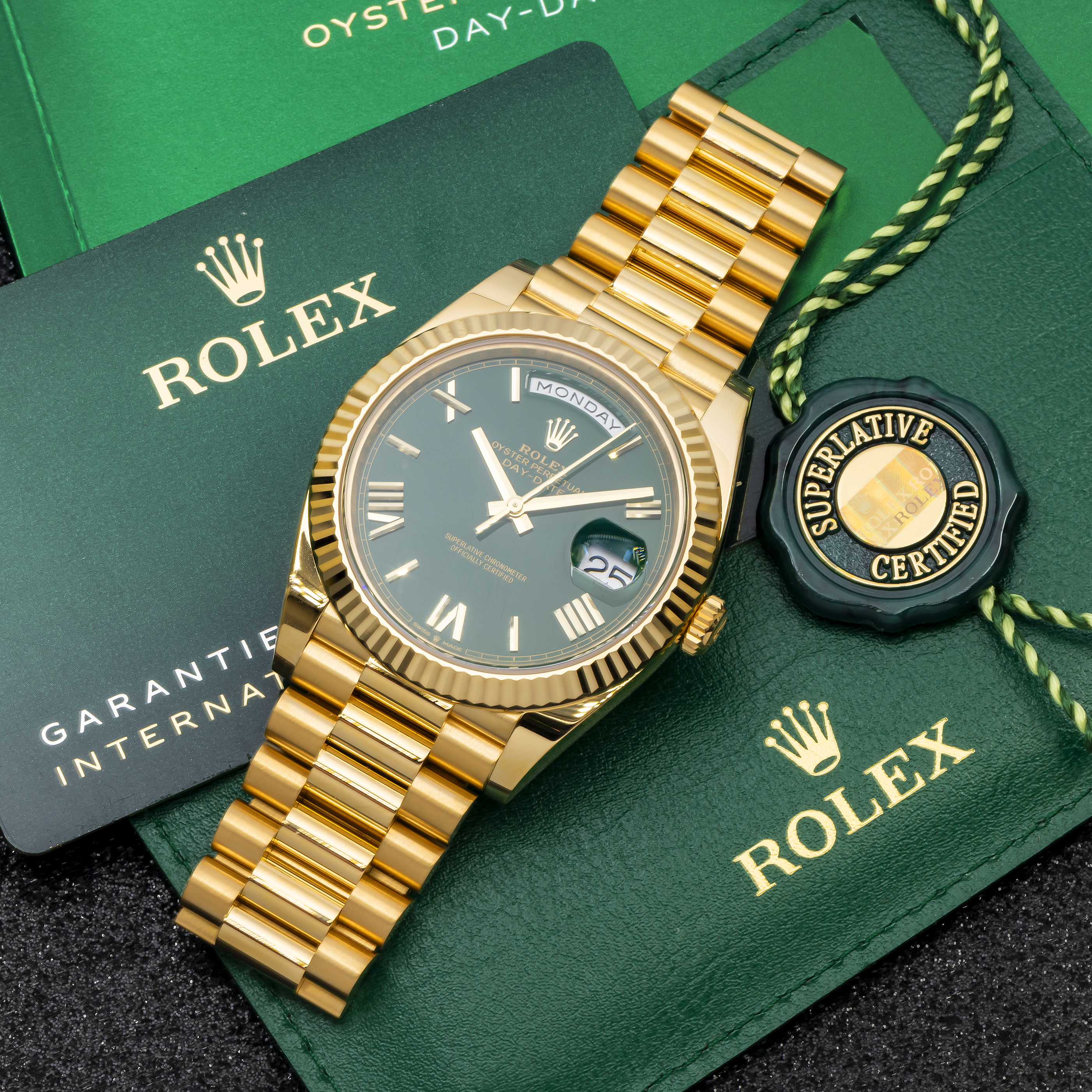 Rolex Day-Date 228238 40MM Green Roman Dial And Fluted Bezel With Yellow Gold Presidential Bracelet