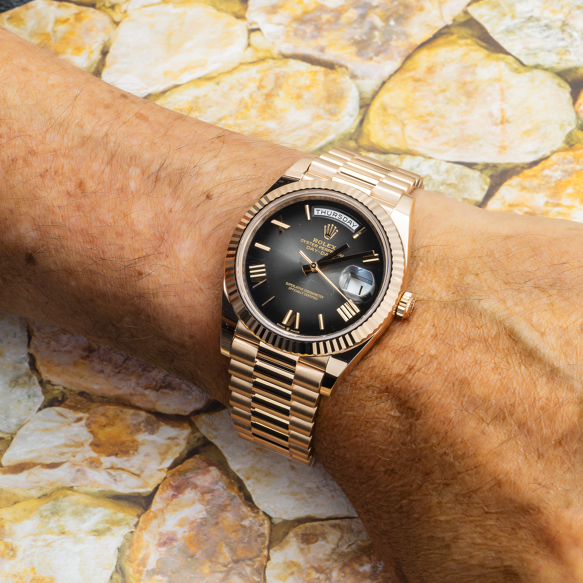 Rolex Day Date 228235 40MM Black Roman Numeral Dial With Rose Gold Presidential Bracelet