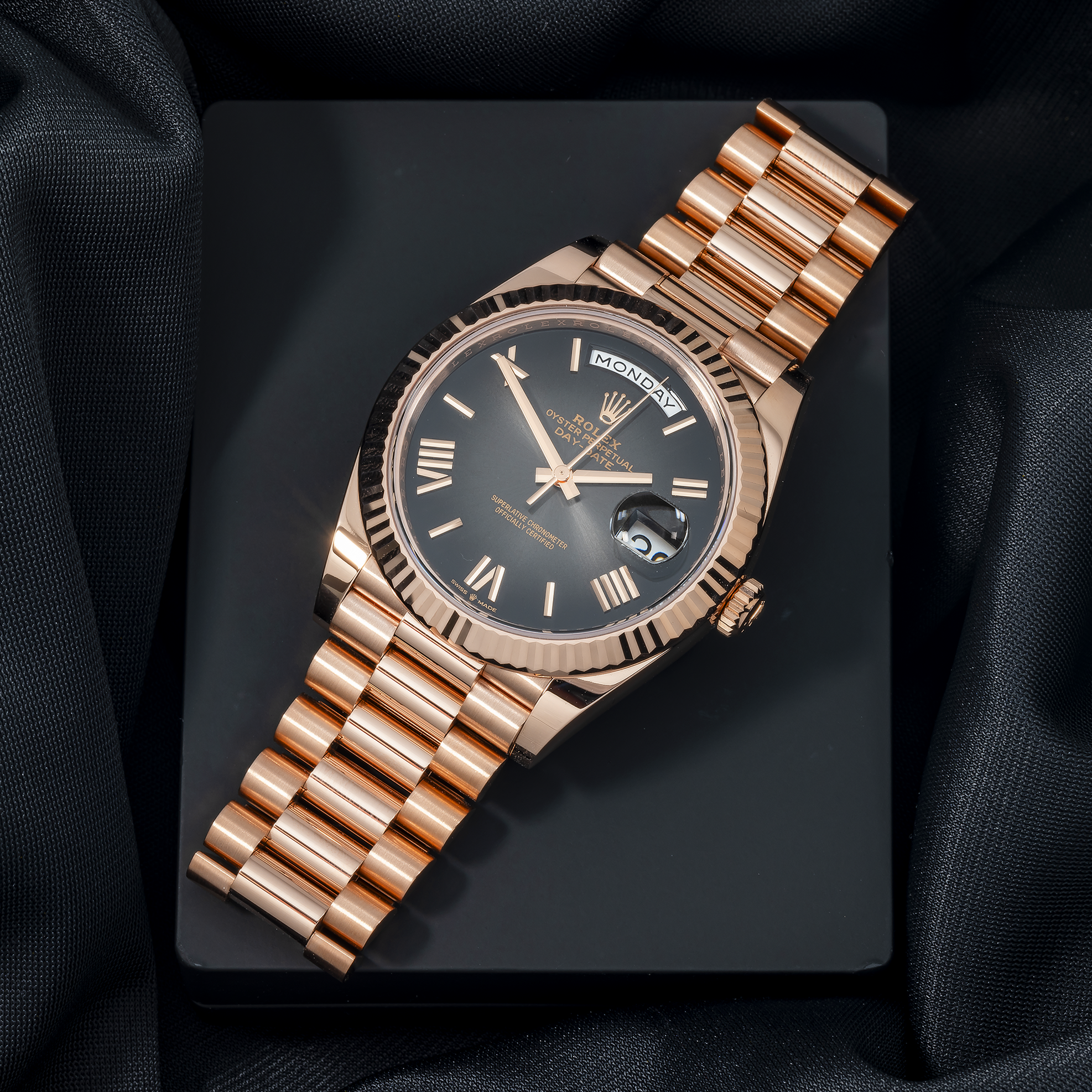 Rolex Day Date 228235 40MM Black Roman Numeral Dial With Rose Gold Presidential Bracelet