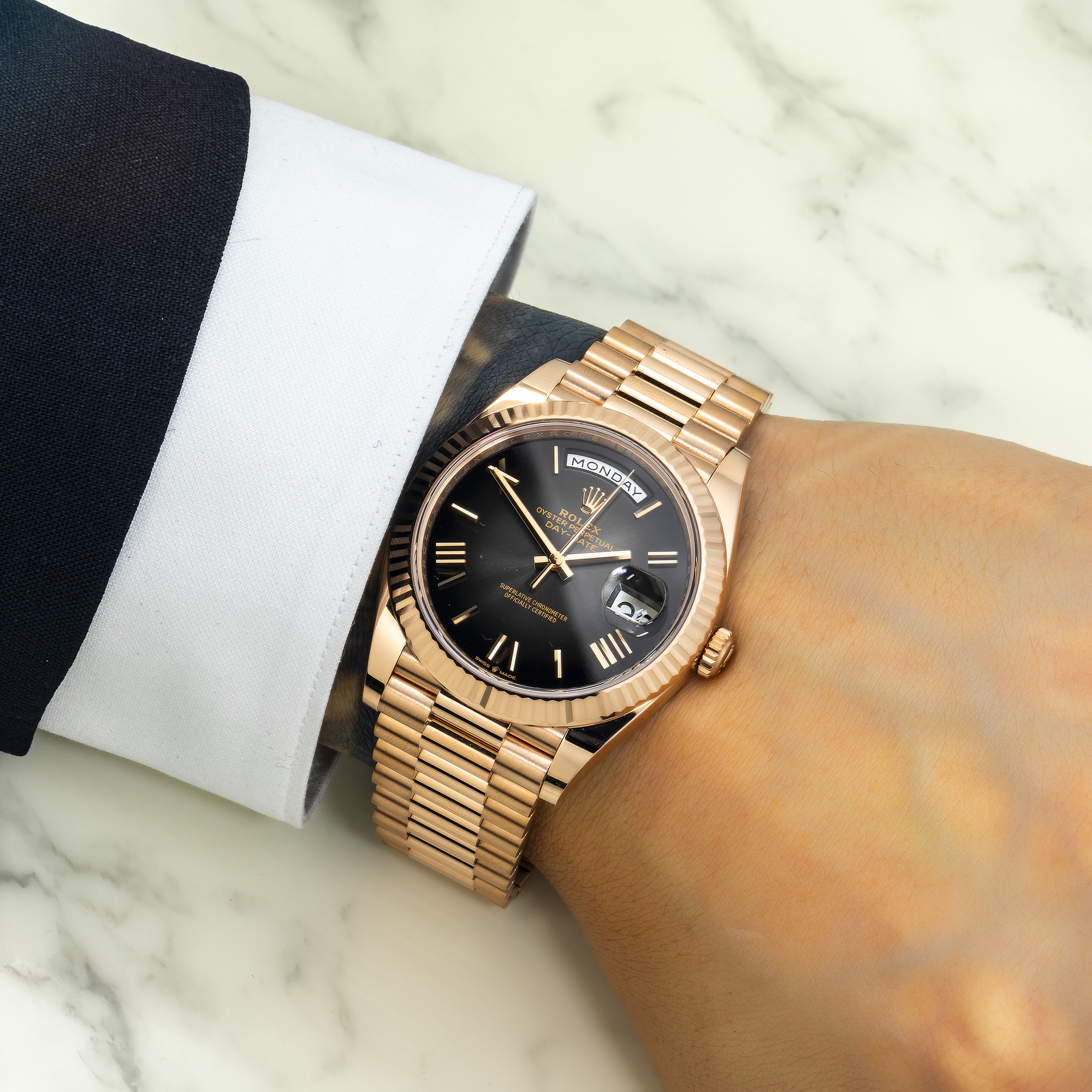 Rolex Day Date 228235 40MM Black Roman Numeral Dial With Rose Gold Presidential Bracelet