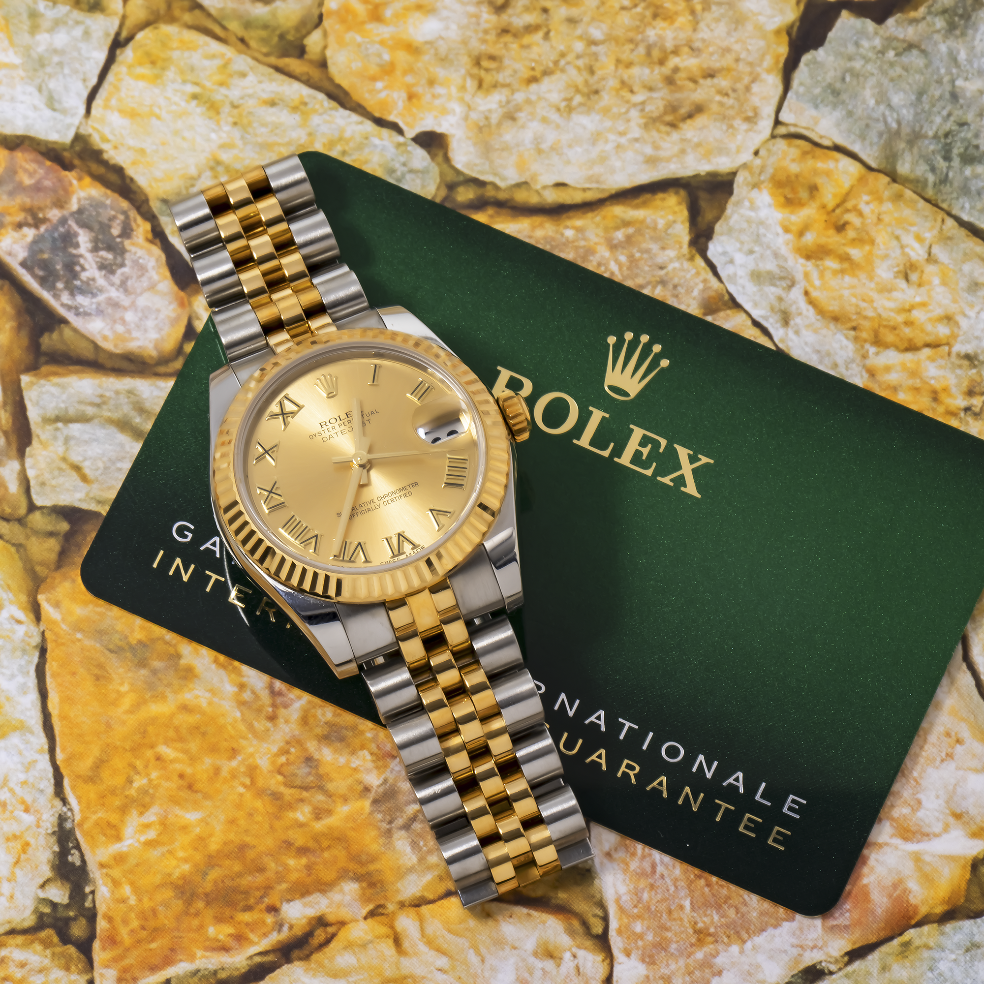 ROLEX DATEJUST 178273 31MM CHAMPAGNE ROMAN NUMERAL DIAL WITH TWO TONE BRACELET