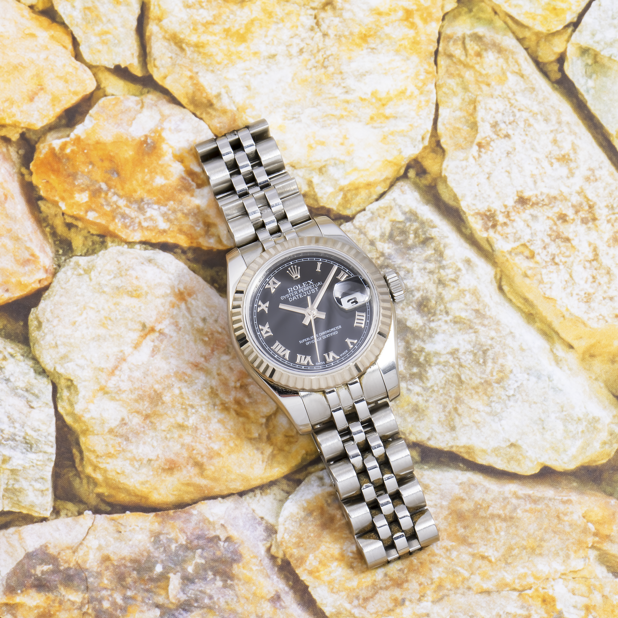 ROLEX DATEJUST 179174 26MM BLACK ROMAN NUMERAL DIAL WITH STAINLESS STEEL JUBILEE BRACELET