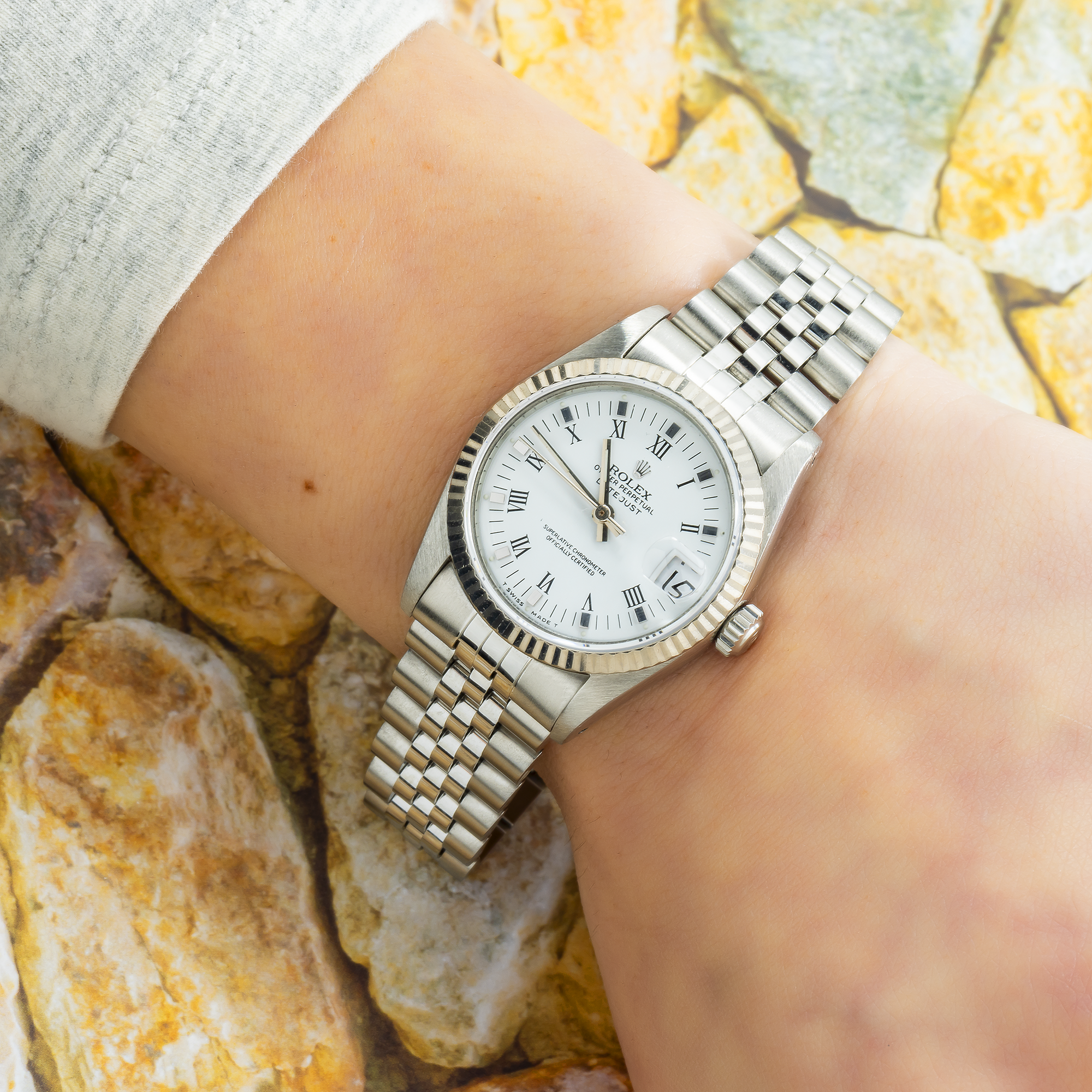 Rolex Datejust 68274 31MM White Roman Dial With White Gold Fluted Bezel And Stainless Steel Jubilee Bracelet