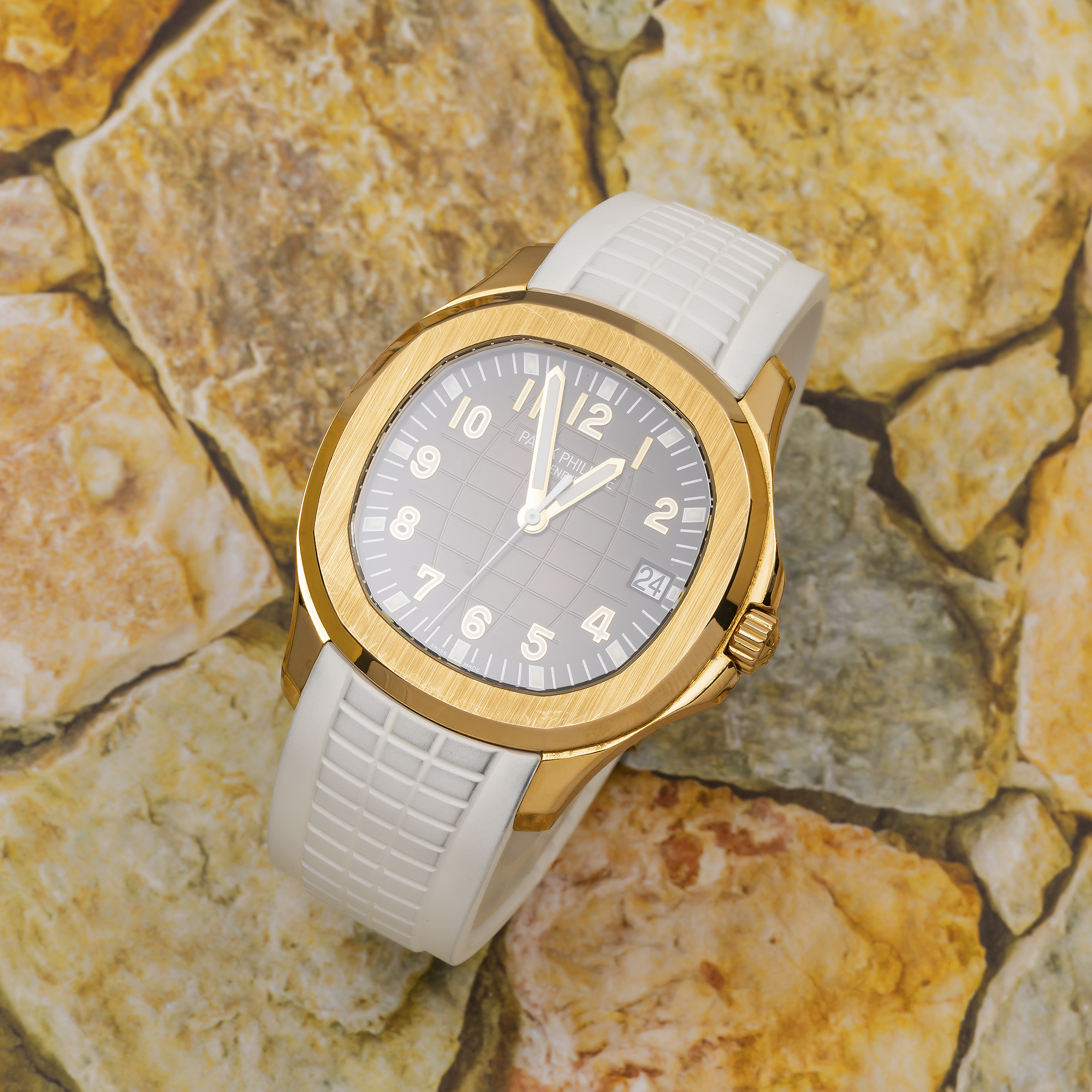 PATEK PHILIPPE AQUANAUT 5167R 40MM BROWN DIAL WITH WHITE COMPOSITE STRAP.