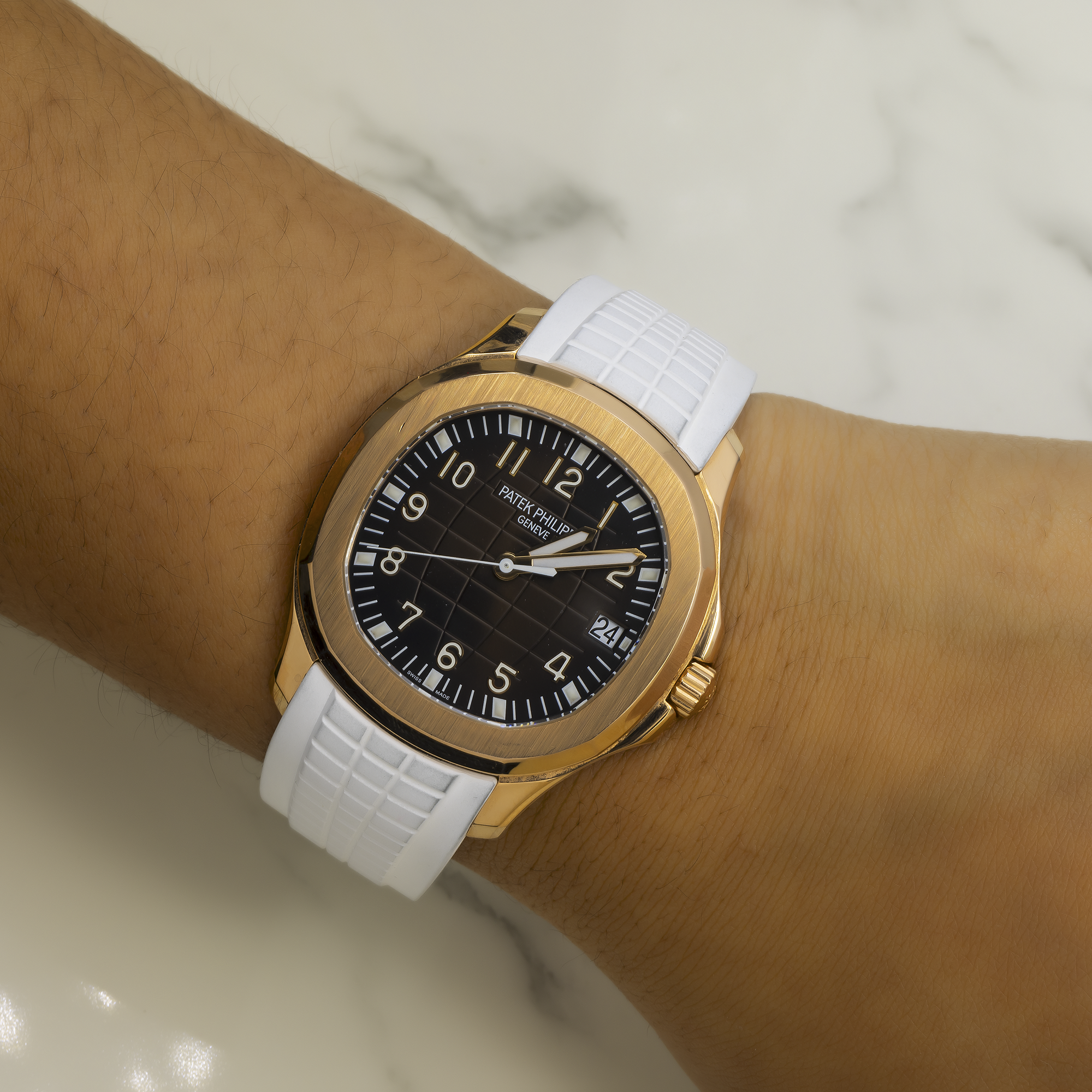 PATEK PHILIPPE AQUANAUT 5167R 40MM BROWN DIAL WITH WHITE COMPOSITE STRAP.