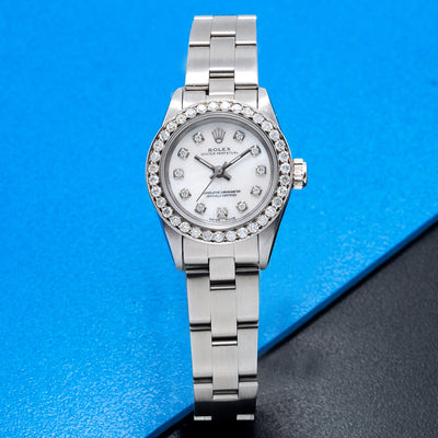 Rolex Oyster Perpetual Diamond Watch, 67193 26mm, White Mother of Pearl Dial with 0.90Ct Diamond Bezel