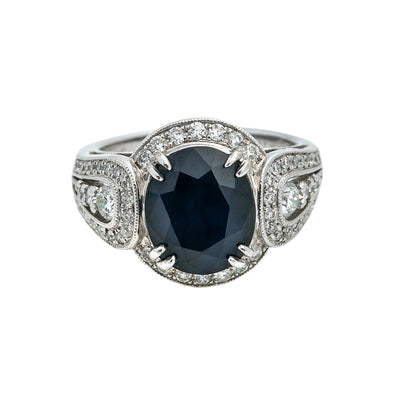 LADIES 18K WHITE GOLD HAND RING WITH 0.92 CT DIAMONDS AND 3.84 CT SAPPHIRE