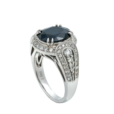 LADIES 18K WHITE GOLD HAND RING WITH 0.92 CT DIAMONDS AND 3.84 CT SAPPHIRE